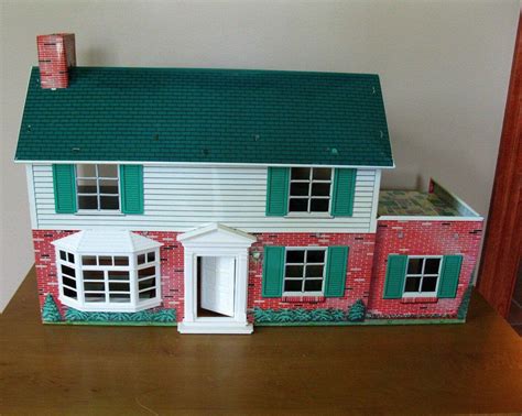 vintage metal two story doll house from 1950's|old metal doll house furniture.